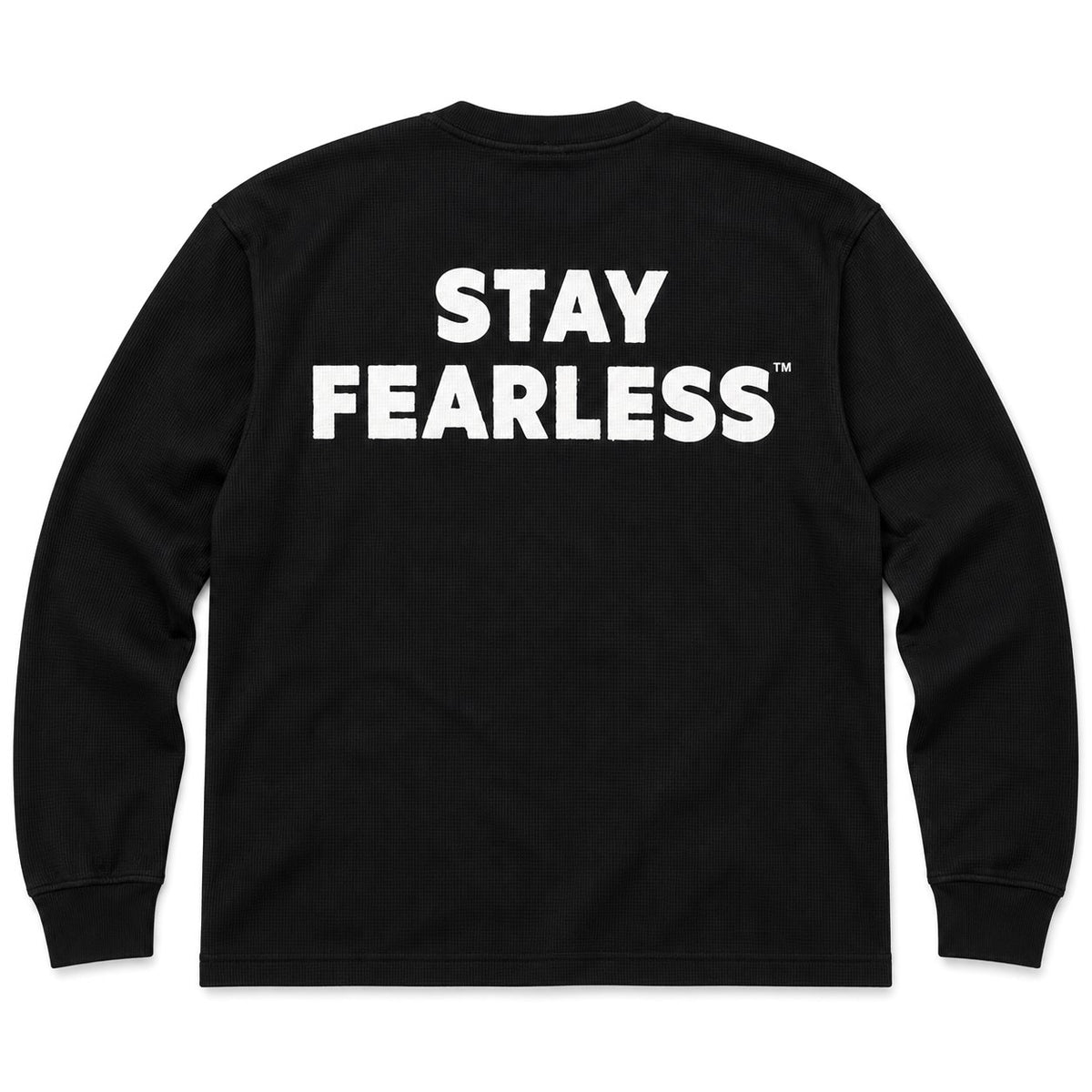 A black long-sleeve waffle-knit t-shirt with 'STAY FEARLESS' printed in bold white capital letters across the chest, shown against a plain white background.