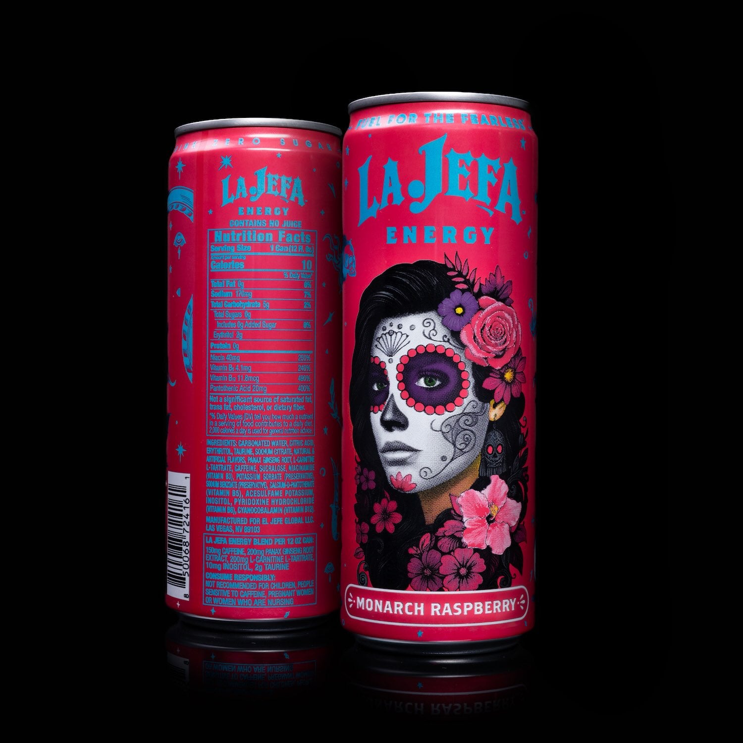 Two red energy drink cans with a colorful design featuring a face with floral elements on a black background.